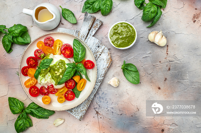 burrata cheese,. fresh vegetables salad on a dark background. Healthy eating concept. Restaurant menu, dieting, cookbook recipe top view