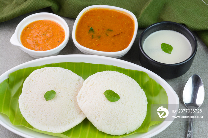 South indian breakfast dish Idli served with sambar and chutney