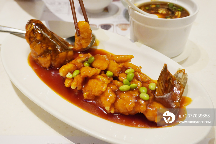 Song Shu fish or Squirrel Mandarin Fish, belongs to Huaiyang cuisine. The dish is named Squirrel Fish because of the way the dish is presented and resembles the fluffy tail of a squirrel.