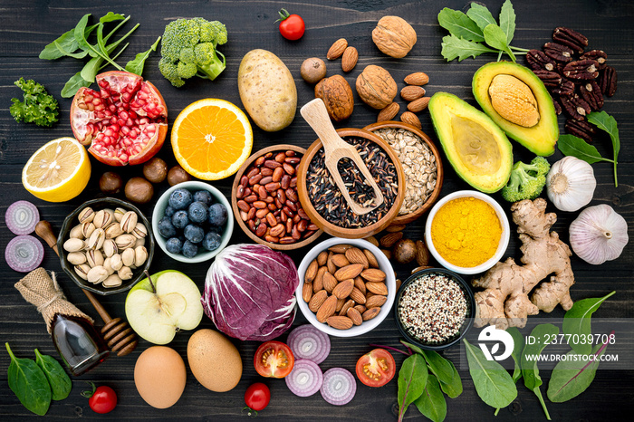 Ingredients for the healthy foods selection. The concept of healthy food set up on wooden background.