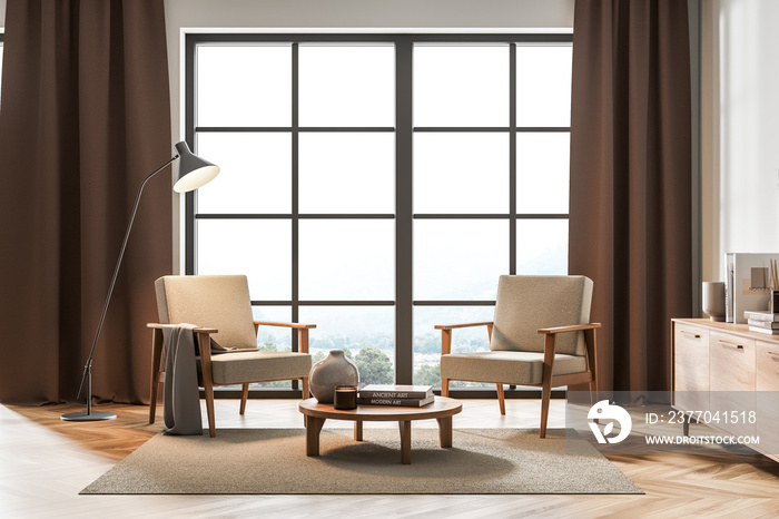 Light living room interior with armchairs and coffee table, panoramic windows