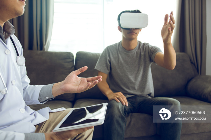 Doctor is using the tablet to send the data to the virtual reality glasses showing the health diagnosis as the patient is wearing and analyzing together at home.