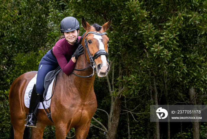 Woman dressage rider and her wonderful Lusitano horse, Azores island, Sao Miguel.