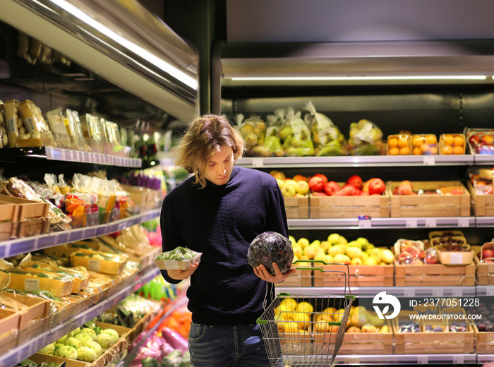 Man buying fruits at the market