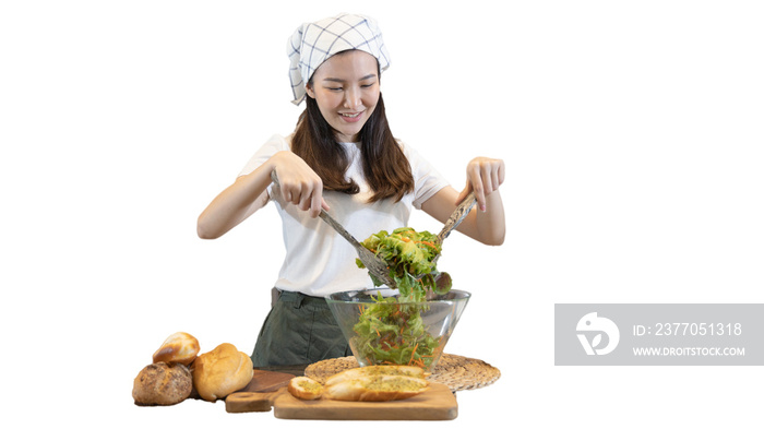 Asian woman making vegetable salad in her home kitchen, Vegetables contain a wide variety of vitamins and minerals, High-fiber and low-calorie diets, Healthy vegetable salad idea, Appetizer concept.