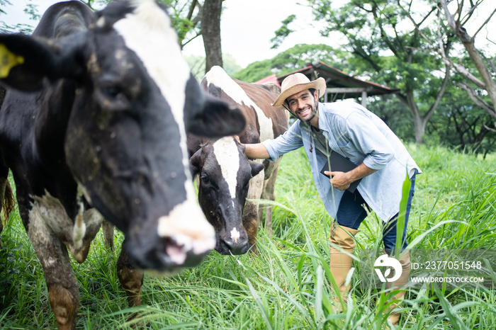 Portrait of Caucasian male dairy farmer working alone outdoors in farm