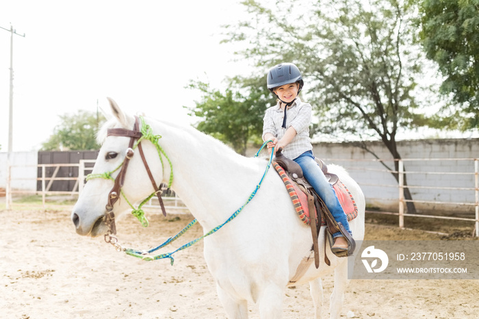 Happy Girl Undergoing Equine-Assisted Therapy