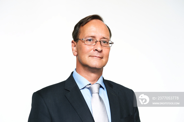 Close up portrait of middle-age man wearing formalwear