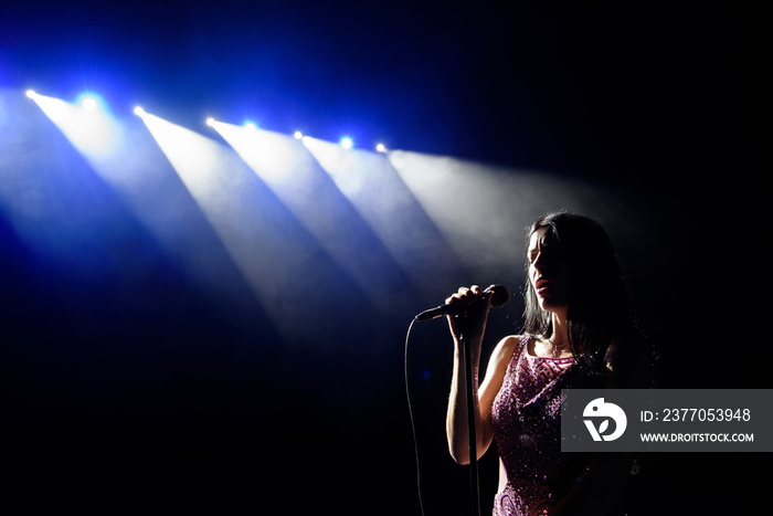 Shadow of singer in light