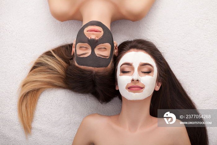 Spa. Group woman getting facial mask and gossip