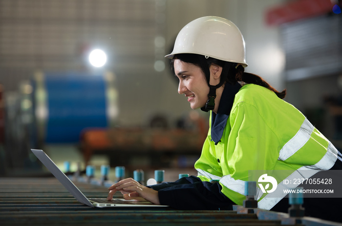 Portrait of a heavy equipment female engineer from a huge industry