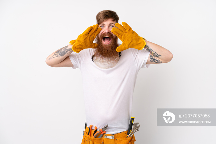 Redhead electrician man with long beard over isolated white background shouting with mouth wide open