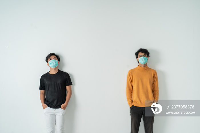 social distancing. people with masks keep their distance during virus symptoms