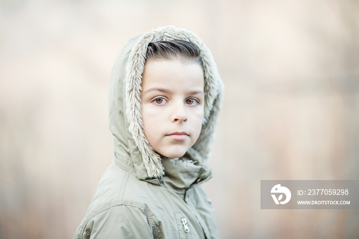 portrait of little boy in winter