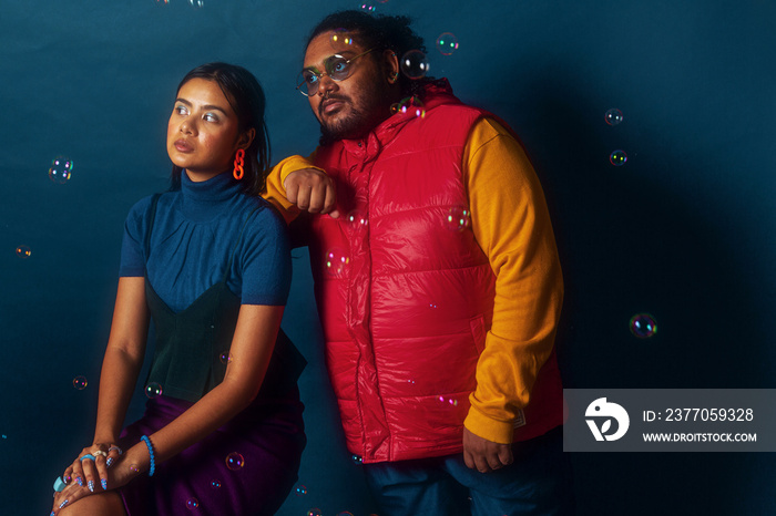 Duo fashion colour blocked studio portrait