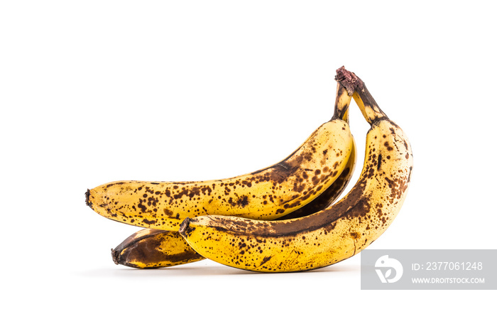 Banana. Over ripe bananas isolated on white with shadows