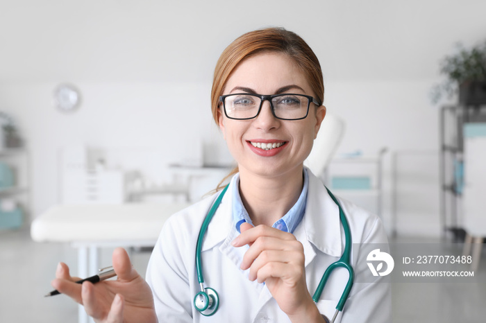 Female doctor using video chat in clinic