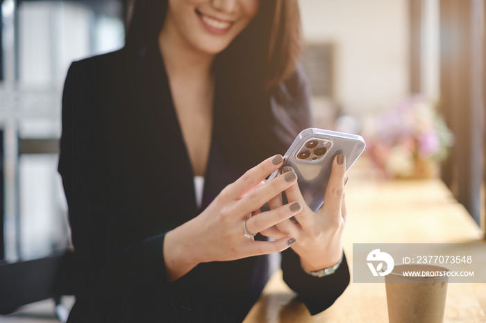 A business woman completes KYC using an online banking program in order to open a digital savings account. The definition of cyber security.