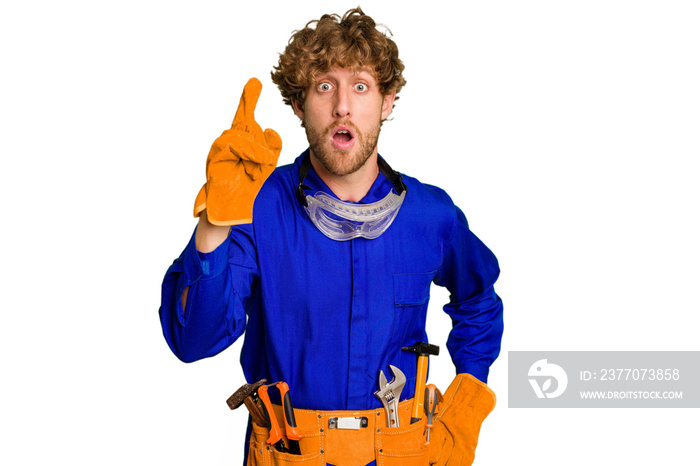 Young caucasian electrician man isolated on white background having an idea, inspiration concept.