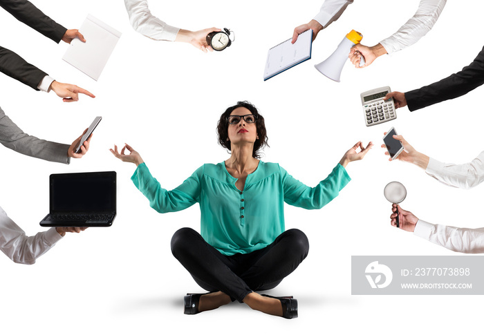 Businesswoman tries to keep calm with yoga due to stress and overwork at wok