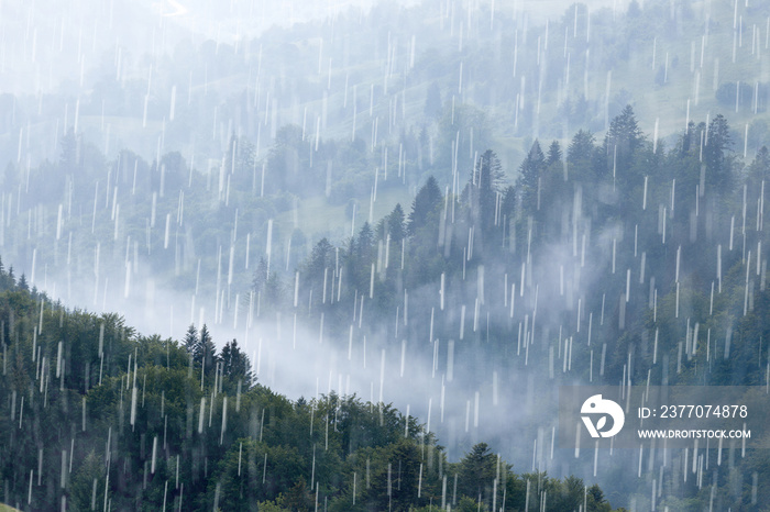 Rain over forest mountains.