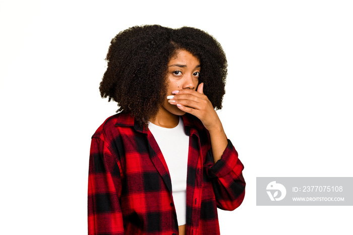 Young African American woman isolated covering mouth with hands looking worried.