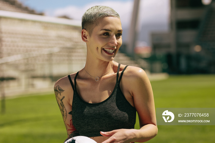 Young woman footballer at the ground