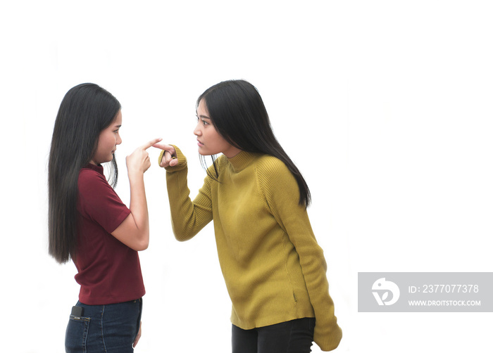 Two girls are angry and pointing faces on white background