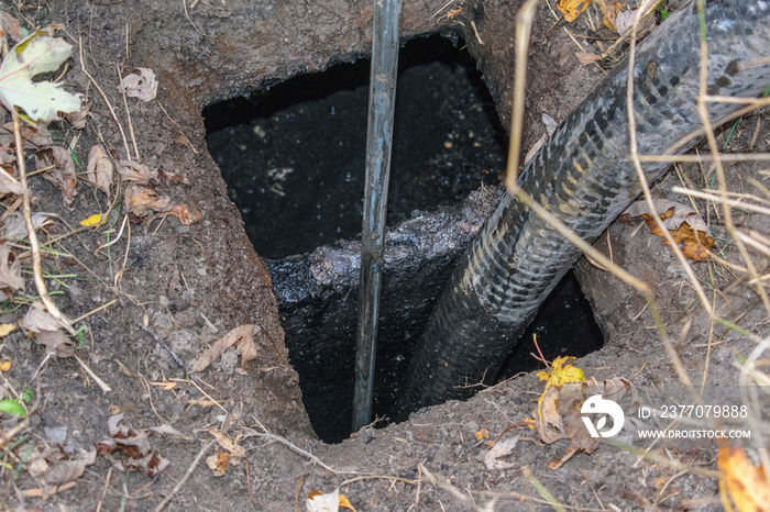 Pumping out of septic tank