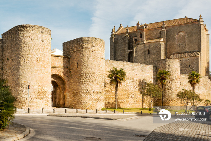 City gates, walls and church of Holy Spirit in historic town Ronda, Spain