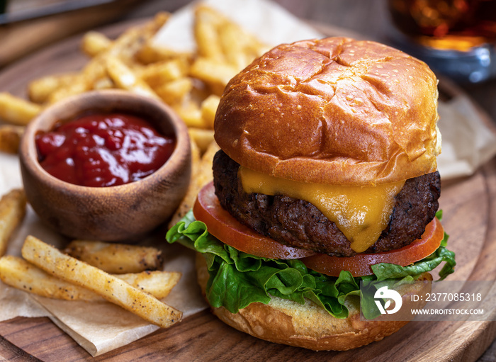 Cheeseburger with lettuce and tomato on toasted bun