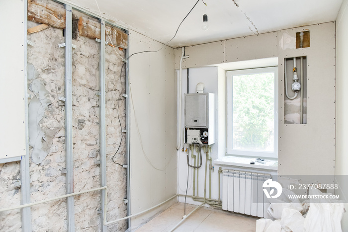 Repair in an apartment in the kitchen, installation of drywall, the process of repair work inside the house