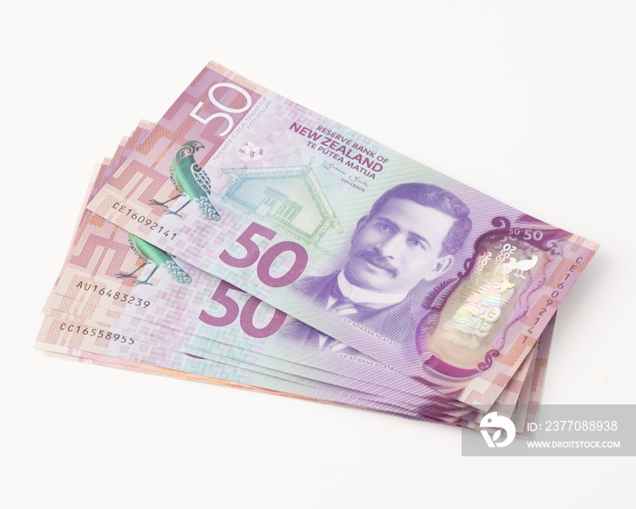 Closeup Stack of New Zealand 50$ Dollar banknotes on white background with copy space for text