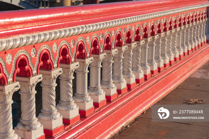 the railing of the Blackfriars Bridge in evening sunlight