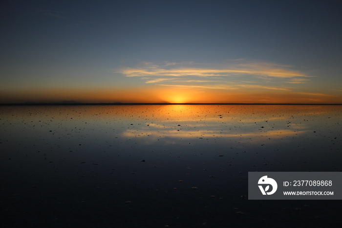 Sunset over Uyuni salt lake in Bolivia