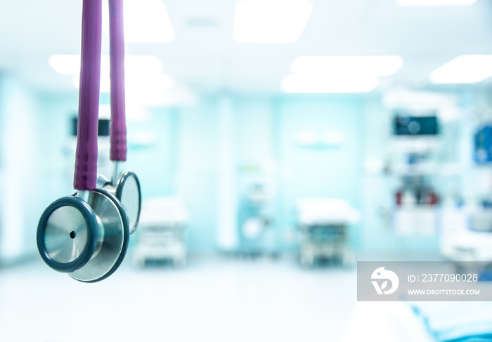 Closeup Medical stethoscope in Emergency room hospital blurry background.