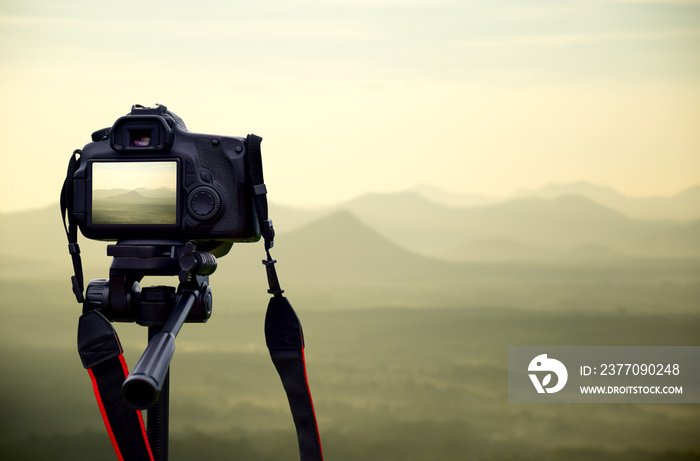 Camera on tripod Photographers take scenic views.