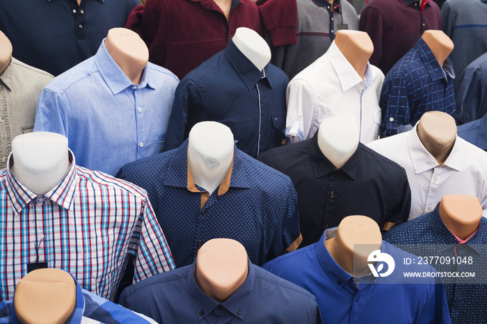 The range of men’s shirts on mannequins in the market in Göynük in Turkey