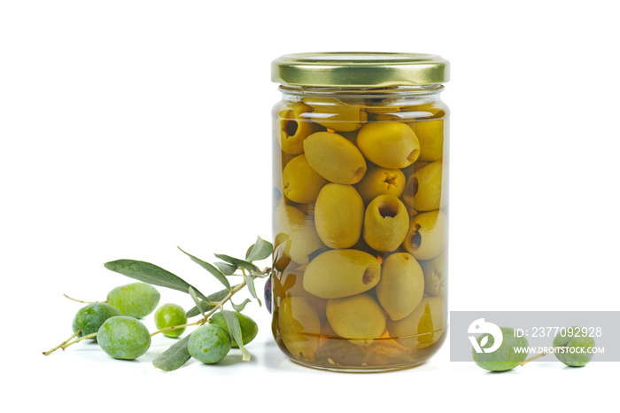 Glass jar with pickled olives, and olive branch near Isolated on white background