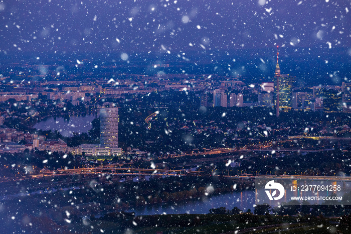 Snowing in Vienna. City seen from Kahlenberg at night.