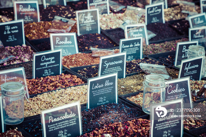 French colorful herb and spices at street market in the village in Provence, France.