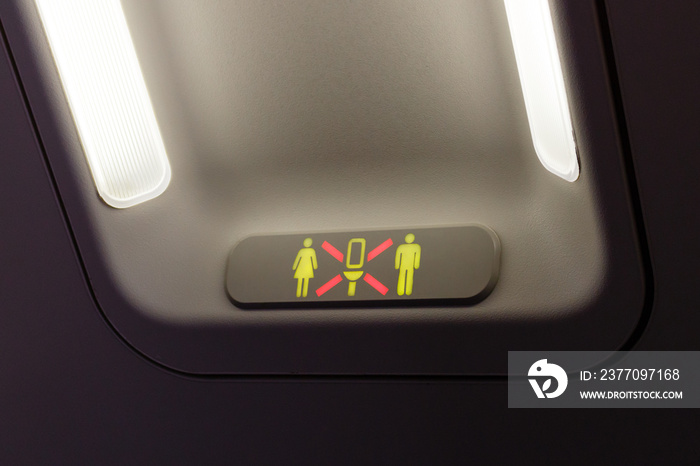 Occupied lavatory sign on the commercial airlines.