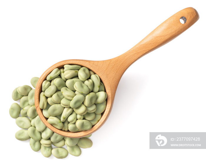 dried green broad beans in the wooden spoon, isolated on white background, top view