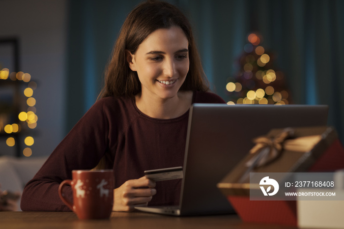 Woman doing online shopping at Christmas