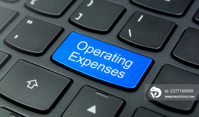 Business Concept: Close-up the Operating Expenses button on the keyboard and have Azure, Cyan, Blue,