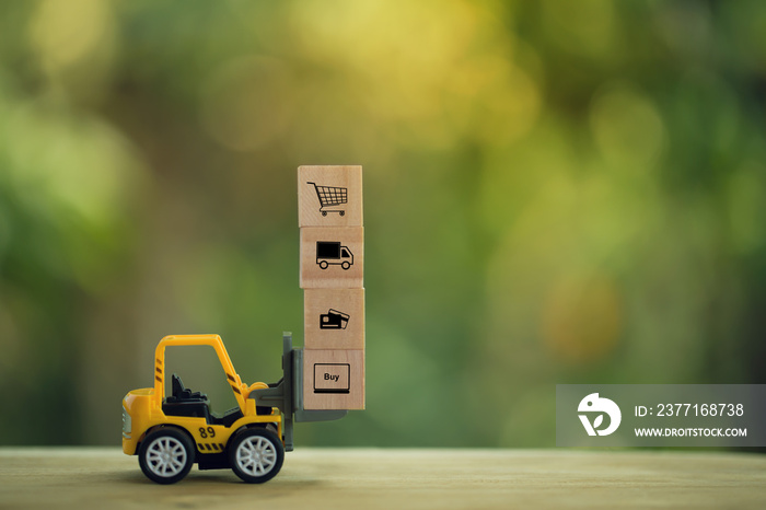 Logistic network distribution and cargo freight concept: Mini fork-lift truck moves a pallet with wo