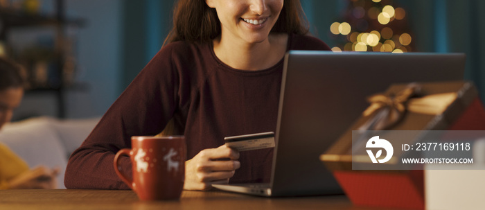 Woman doing online shopping at Christmas