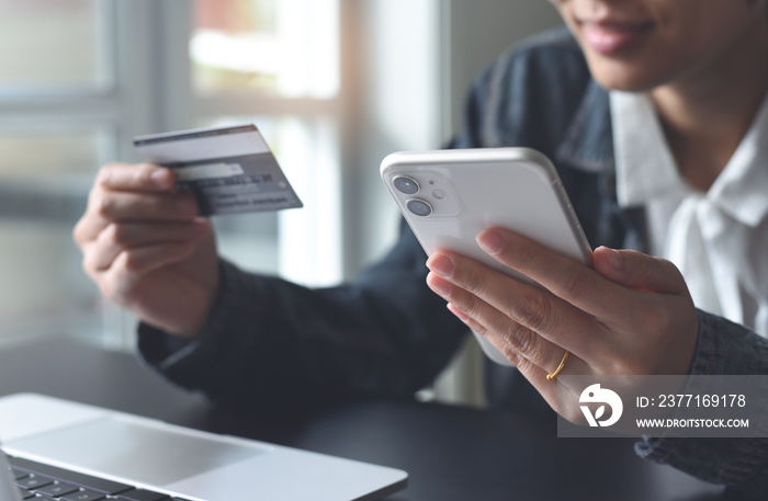 Online shopping, digital banking, E-commerce concept. Woman hand using mobile smart phone payments a