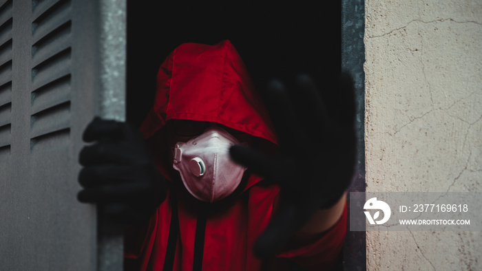 Money Heist character is dressed in new clothes, protected by the new covid19 virus, mask and gloves