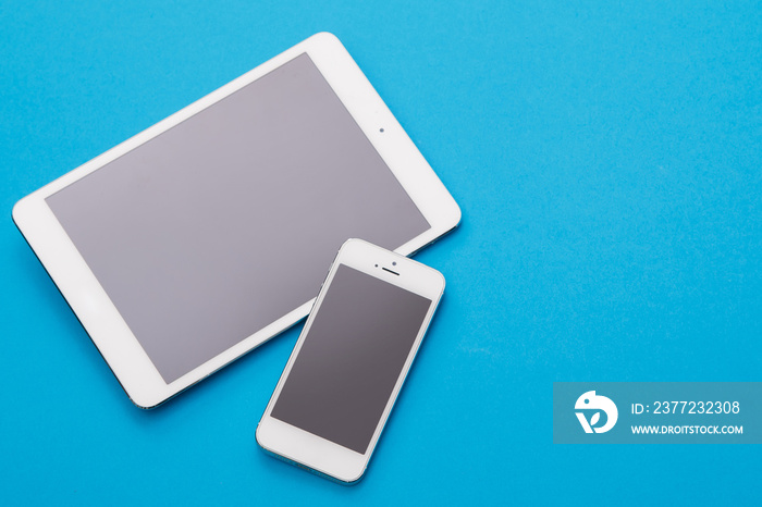 White smart phone and tablet